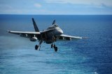 An FA-18 Hornet coming in for a landing.