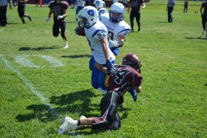 Crusaders woes continue with 50-12 loss at Trinity Classical Academy Kings Christian's Daniel Salas tackles his man last week against Desert Christian