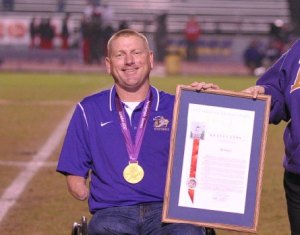 Fabry's quest for more 'Gold' will continue in Rio de Janeiro Paralympics Jeff Fabry at Lemoore High School football game accepting proclamation.