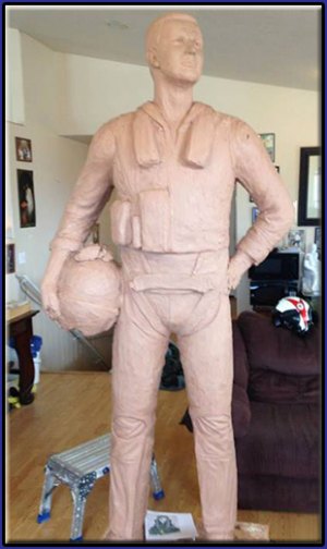 Pair of aviators and community members team up to raise funds for Navy memorial A clay rendition of what the final memorial statue will look like as sculpted by Utah artist Dee Jay Bawden.