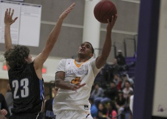 Allen Perryman looks to score against Clovis North on Tuesday night in the LHS Event Center.