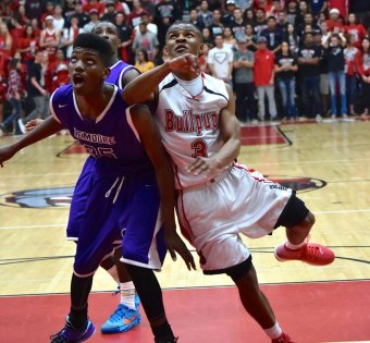 Jaylunn English battles for the ball.