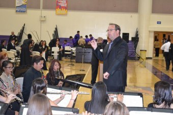 Band Director Shawn McElhaney leads the Tiger band.