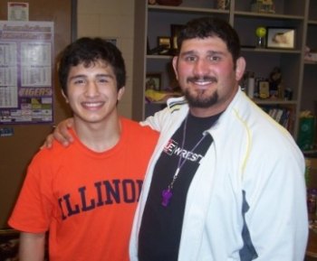 Lemoore's Martinez up for 'Heisman Trophy' of NCAA wrestling, and national title Former Tiger wrestling champ Isaiah Martinez and then coach Marcio Botelho.
