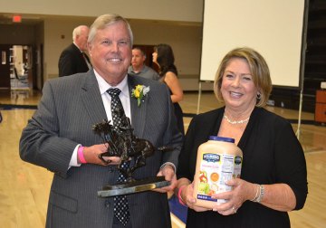 Don Warkentin at wife Betty at Friday night retirement dinner held in the West Hills College Golden Eagle Arena.