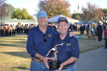 Local vets honor Navy Cross recipient Harry Zinser for his heroic deed 43 years ago Jim Lloyd, the aviator Harry Zinser (right) saved 43 years ago, is pictured with the Navy Captain.