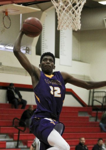 Jaylunn English looks for a dunk against Kennedy High