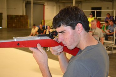 Tyson Pereira takes aim Monday night.