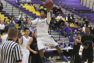 Arthur Madison finds the lane against Hoover Tuesday night. The Tigers beat Hoover 61-56 and will play Garces in Bakersfield Thursday night at 7 p.m.