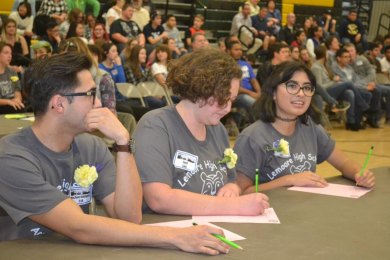 Lemoore High School's (L to R) Michael Anthony Sanchez, Jael Millett, Annelisa Andrada during the Super Quiz. LHS finished second in the Super Quiz and second overall to Middle College High School.