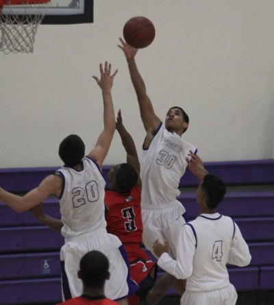 Allen Perryman goes up for two against Hanford.