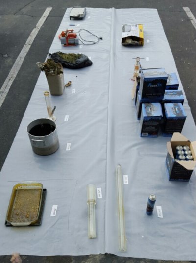 Objects found after suspected narcotics lab fire.