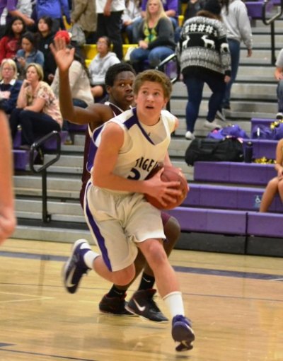 Spencer Stringer eyes the basket in easy win over Mt. Whitney