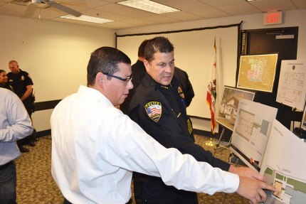 File photo. Chief Darrell Smith with Assemblyman Rudy Salas.