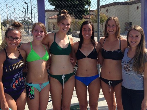 girls' swimming team tops in the pool. high school girls swimsuit. 