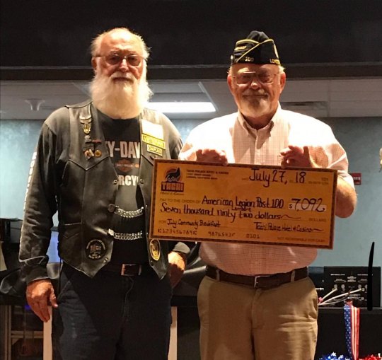 The Tachi Palace Hotel & Casino presented a $7,096 check 


to American Legion representatives William Overby and 
Randy McCord.