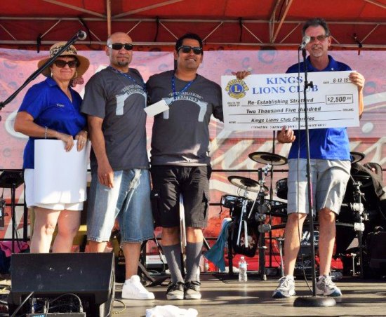 Stratford organization hopes to bring new life to Kings County community Ramon Chavez and Rob Isquierdo Jr. accept a check for $2,500 from Kings Lions Club President Ray Etchegoin for Reestablishing Stratford.