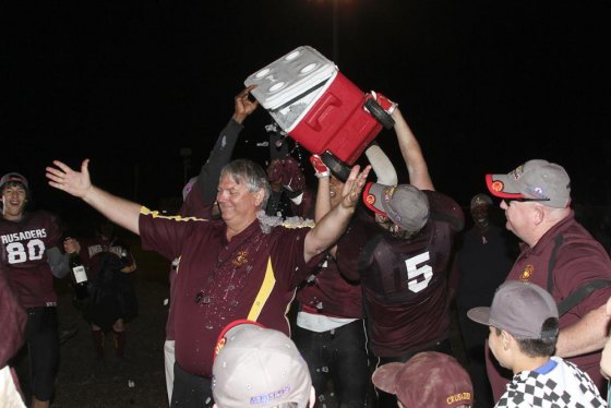 Crusader Coach Cameron Brooks after last year's title game.