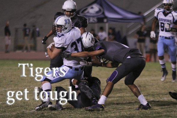 Tigers turn tough on Homecoming as they swamp Redwood in WYL opener