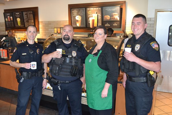 Lemoore Cmdr. Steve Rossi (left) with Officer Mark Pescatore, Starbuck's Manager Mellissa Harbotte and Office Anthony Braley at "Coffee with a Cop."