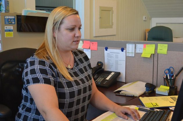 New Lemoore Chamber Executive Jenny MacMurdo at her desk in the Chamber's office.