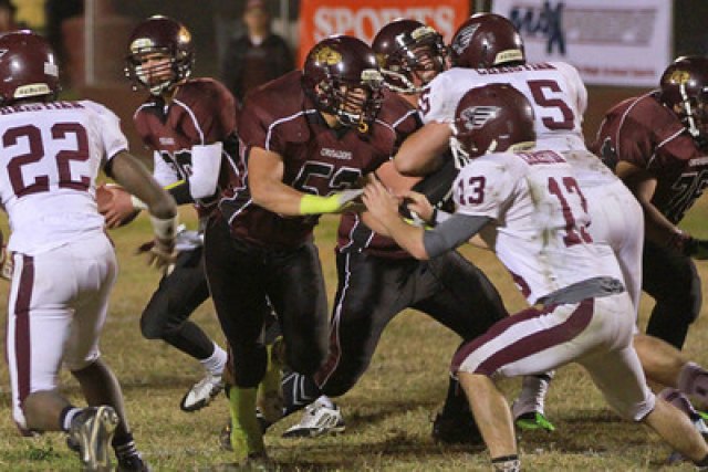 Quarterback Josh Robinson gets good protection from his offensive line.