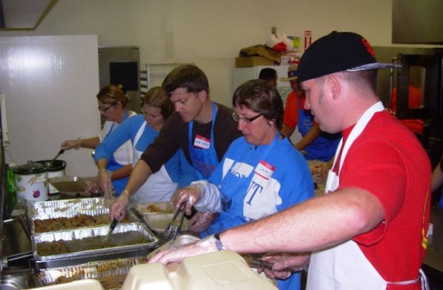 Volunteers at the 2011 Community Dinner prepare over 1,900 meals.